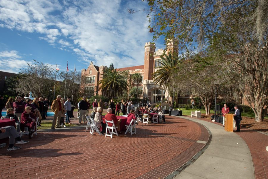 FSU President Richard McCullough addresses attendees at the dedication ceremony for the statue of President Emeritus John Thrasher on Saturday, Nov. 19, 2022, at Westcott Plaza. (FSU Photography Services)