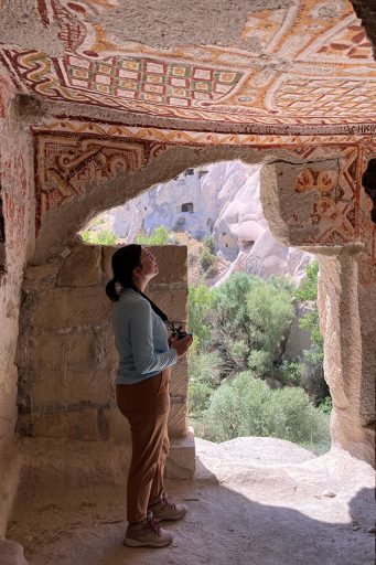 Maddie Gilmore-Duffey examines a rock-cut church.