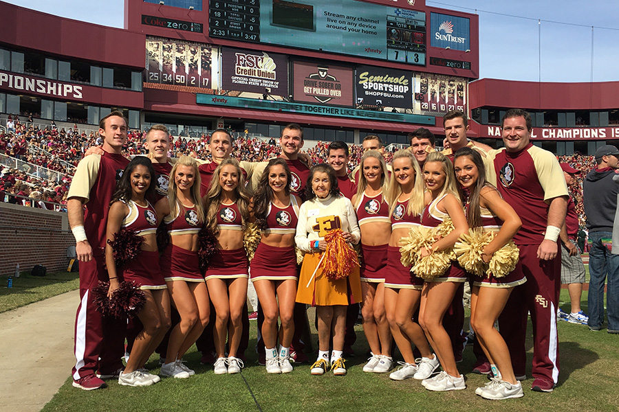 Maggie Allesee with FSU Cheerleaders at Doak Campbell Stadium in 2015.