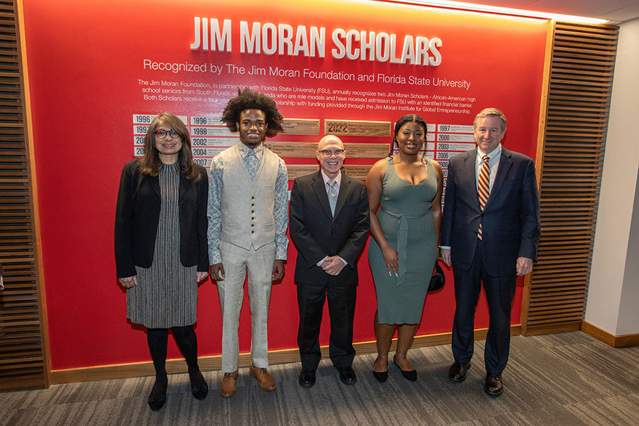 From left: FSU First Lady Jai Vartikar, Moran Scholar Darrell Worrell, the Jim Moran Eminent Scholar in Business Administration and Director of Research Bruce Lamont, Moran Scholar Stephanie Adebaworin and FSU President Richard McCullough.