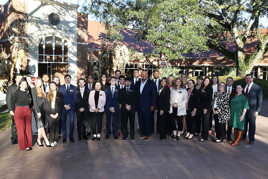 The FSU Legislative Internship Program's inaugural class poses with Sen. Corey Simon after their pinning ceremony.