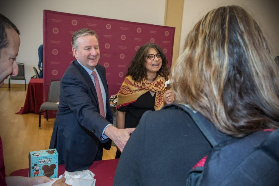 FSU President Richard McCullough and FSU First Lady Jai Vartikar hand out sweet treats at the annual President's Ice Cream Social, Thursday, April 13, 2023. (FSU Photography Services)