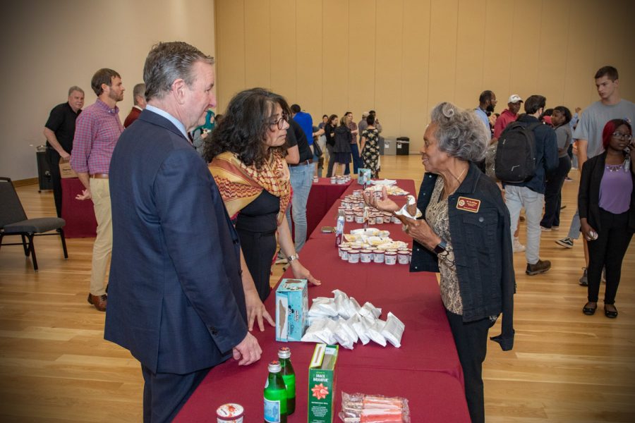 FSU President Richard McCullough and FSU First Lady Jai Vartikar speak with Ms. Eva Killings at the annual President's Ice Cream Social, Thursday, April 13, 2023. (FSU Photography Services)