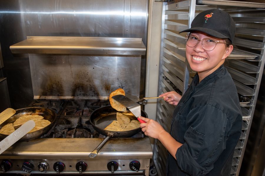 Cong you bing, or “scallion pancake,” is a Chinese savory, unleavened flatbread folded with oil and minced scallions. Unlike Western pancakes, they’re made from dough instead of batter. (Seamus Toner, FSU Center for Global Engagement)