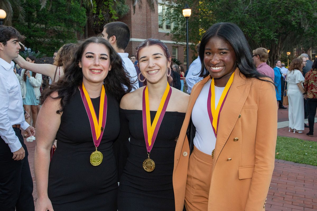 Students pose for photos after the ceremony.