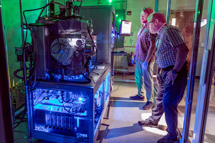 Andre Juliao, left, a doctoral student, and Lance Cooley, a professor of Mechanical Engineering at the FAMU-FSU College of Engineering and director of the Applied Superconductivity Center. (Mark Wallheisier/FAMU-FSU College of Engineering)