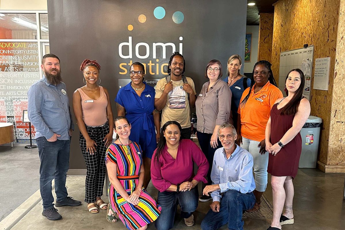 Domi's 2023 Spring Cohort of the Gear Up Program. L to R (back-row): Robert Blacklidge, executive director of Domi Station with program participants Kiara Broner, Vironshay Walker, Juming Delmas, Jessica Schilling, Melanie Simmons, Keisha Washington and Kara Holbert, associate director. L to R (front-row): Program participants Maria Bryan, Charmaine Green and Matthew Borman.