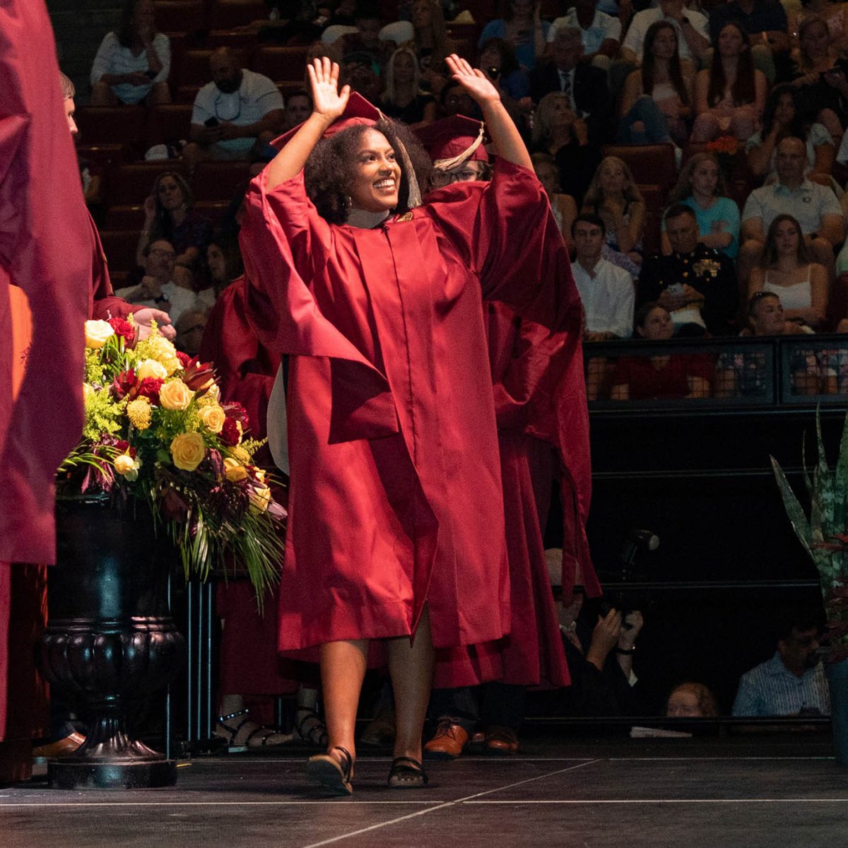 A student celebrates during summer commencement Friday, Aug. 4, 2023, at the Donald L. Tucker Civic Center. (FSU Photography Services)