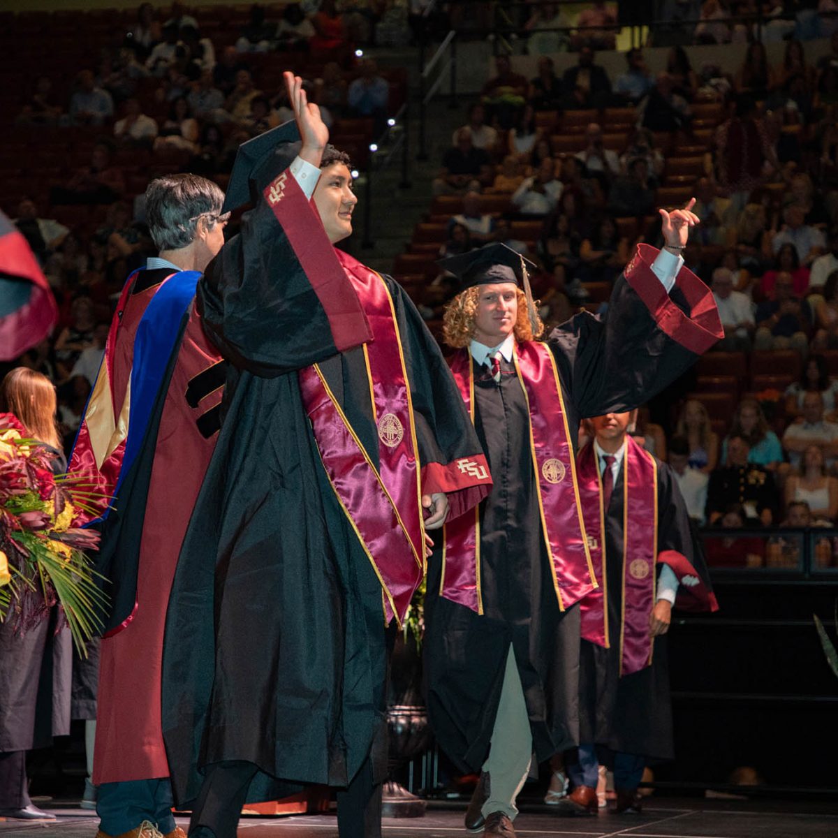 A student celebrates during summer commencement Friday, Aug. 4, 2023, at the Donald L. Tucker Civic Center. (FSU Photography Services)