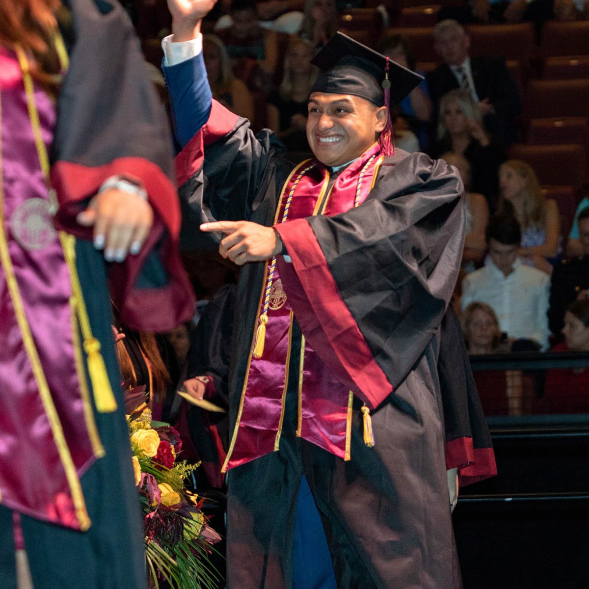 A student celebrates during summer commencement Friday, Aug. 4, 2023, at the Donald L. Tucker Civic Center. (FSU Photography Services)