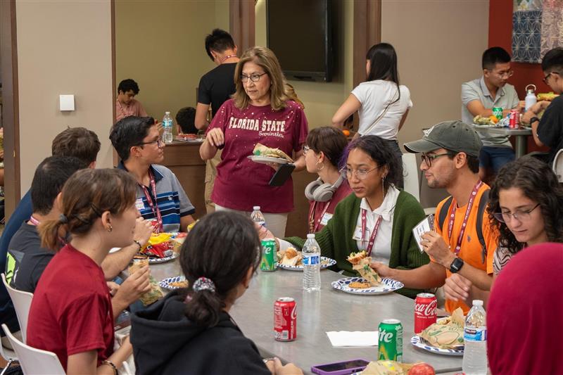 International Student Advisor Betty Jensen welcomes new students during the CGE's third international student orientation session on Friday, Aug. 25. (The Center for Global Engagement at FSU)