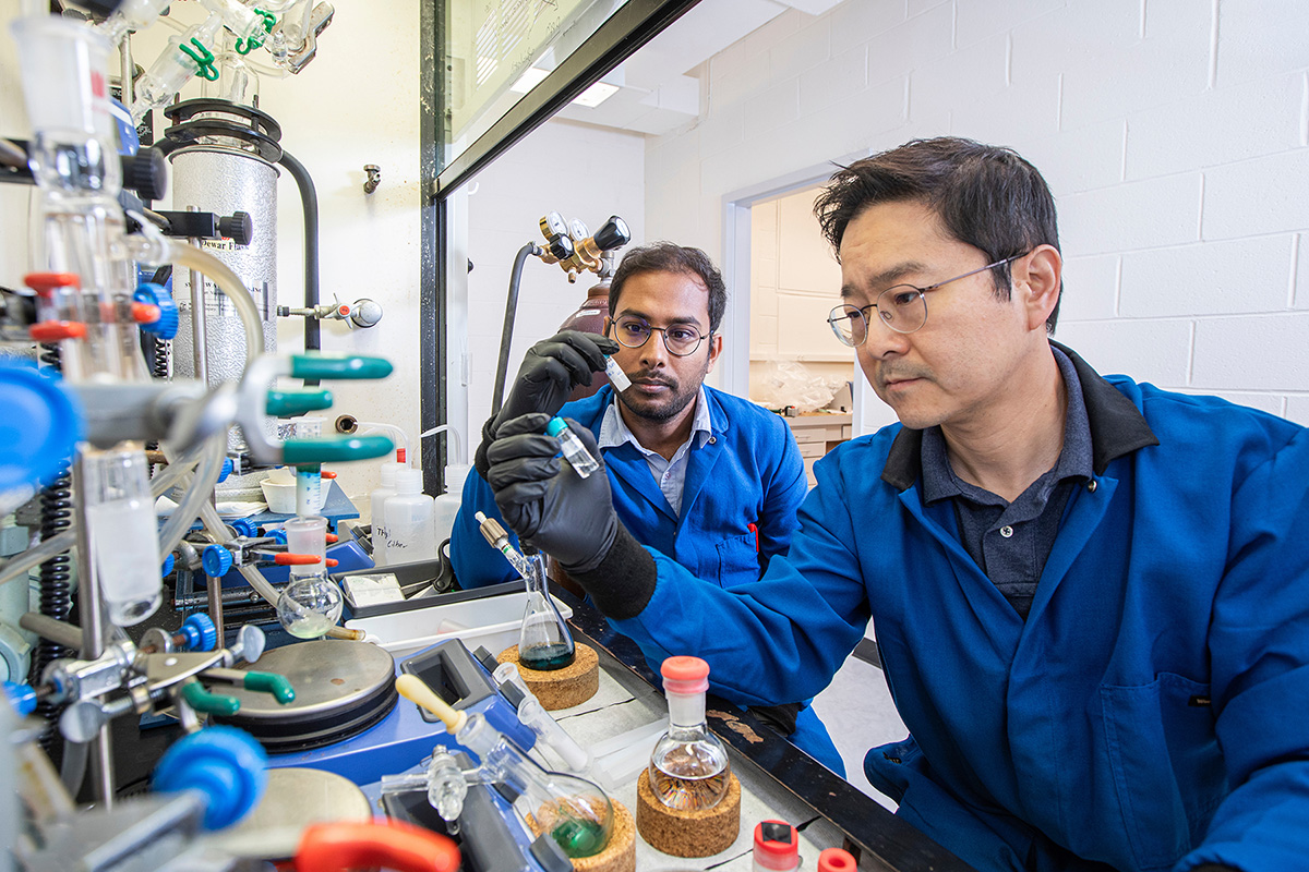 From left, postdoctoral researcher Biswajit Saha and FAMU-FSU College of Engineering Associate Professor Hoyong Chung in in the Dittmer Chemistry Lab at Florida State University. (Photo: Mark Wallheiser/FAMU-FSU College of Engineering)