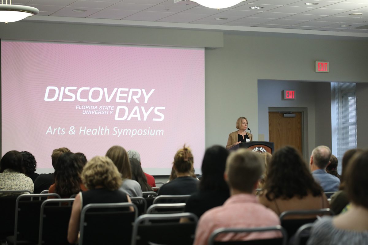 Lori F. Gooding, associate professor of music therapy and music education, presents the various interdisciplinary research projects that advocate for music therapy’s role in integrative health care at the Arts and Health Symposium Oct. 6, 2023. (Tyler Hast)