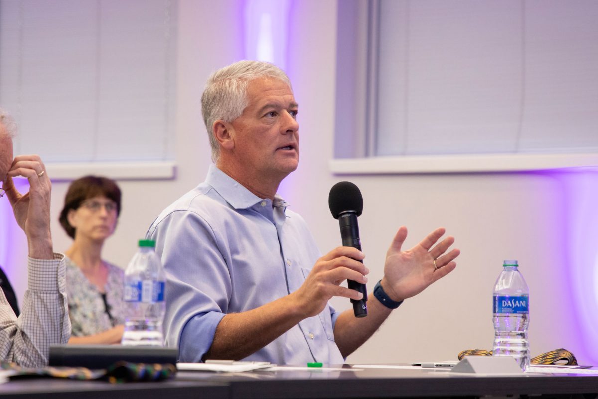 Judge Chris Rumana gives feedback and asks questions following a presentation at the FSU Discovery Challenge event on Wednesday, Oct. 4, 2023. (FSU Photography Services)