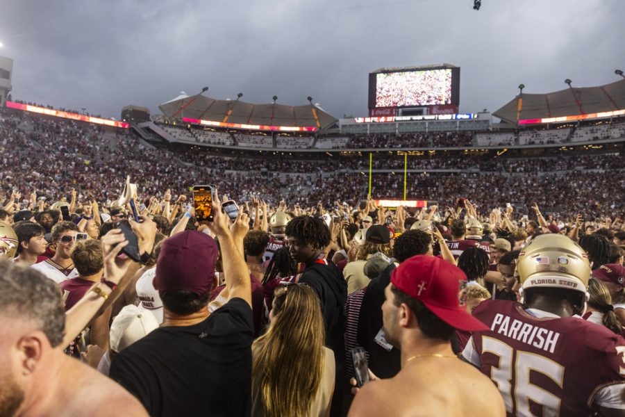 Fans celebrate with the team on the field as the Florida State Seminoles defeat the Alabama Crimson Tide 31-17 at Doak Campbell Stadium on August 30, 2025. (Matthew McConnell/Florida State University)