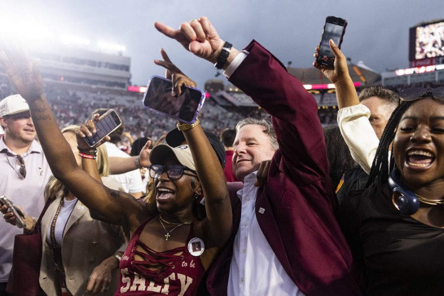 FSU President Richard McCullough celebrates with the team on the field as the Florida State Seminoles defeat the Alabama Crimson Tide 31-17 at Doak Campbell Stadium on August 30, 2025. (Matthew McConnell/Florida State University)