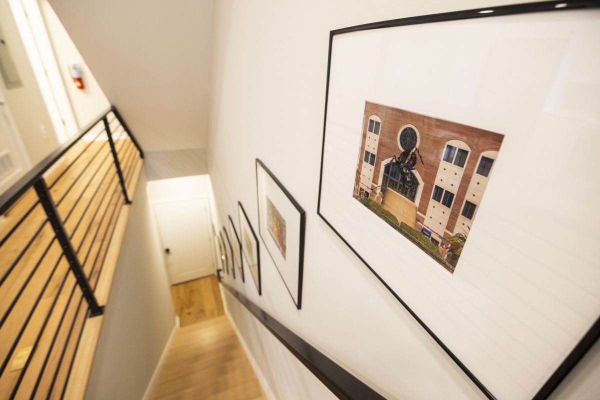 Staircase leading downward, with photo of the FSU stadium on the wall