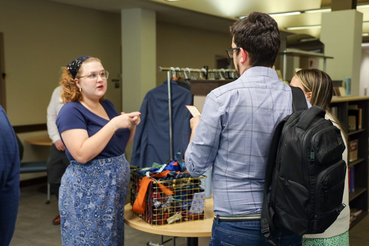 People speak by a race of clothing