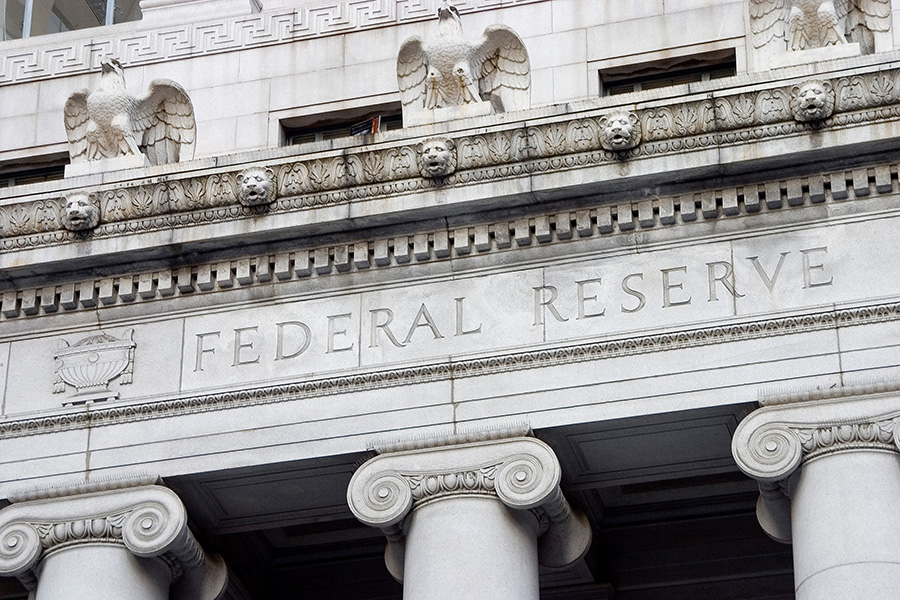 Close up of a building that says "FEDERAL RESERVE