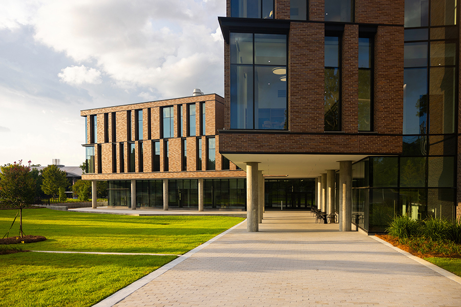 Building by green grass