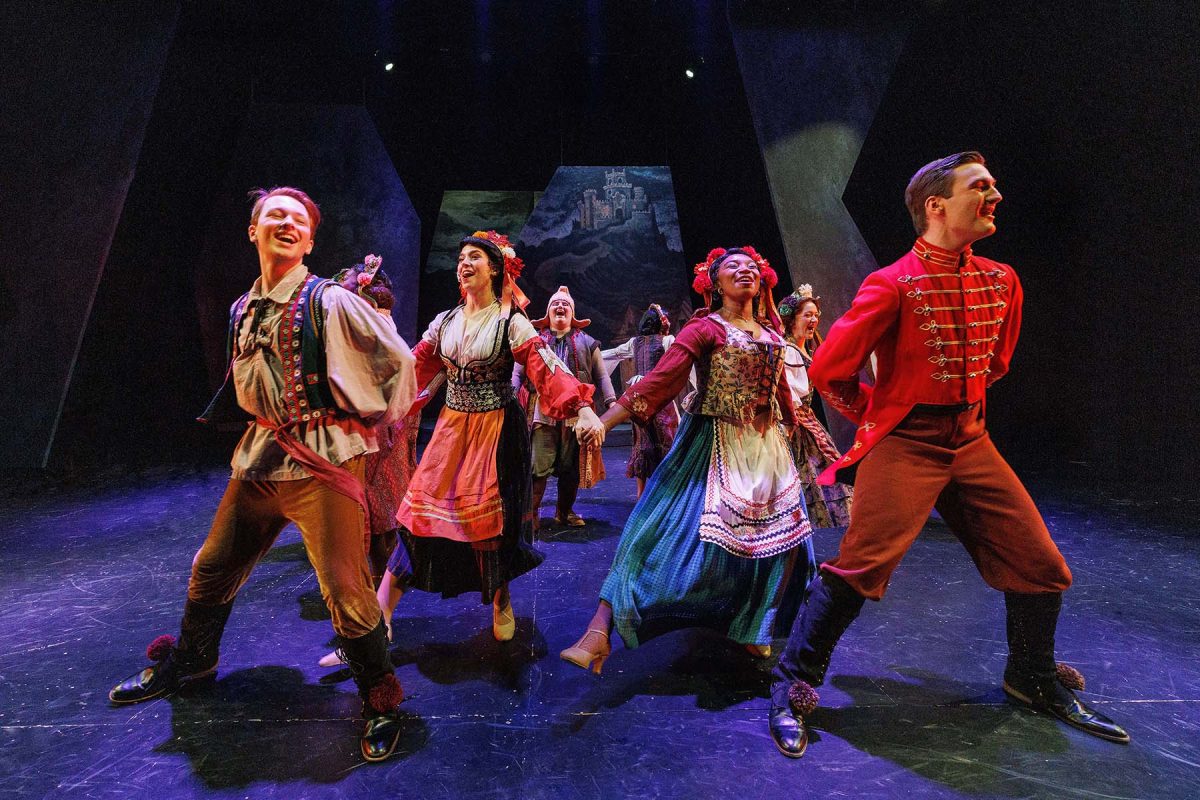 People perform on a stage