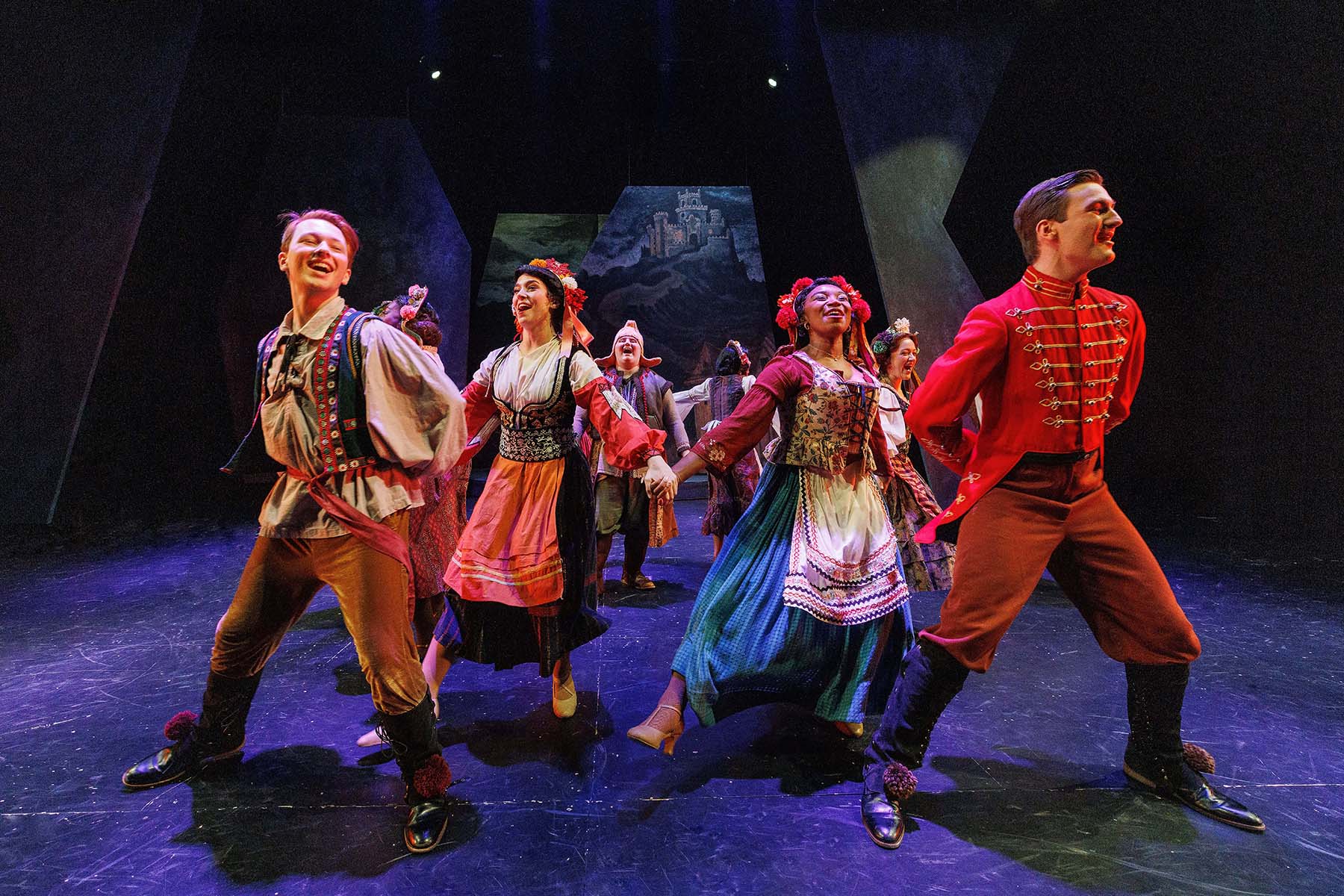 People perform on a stage