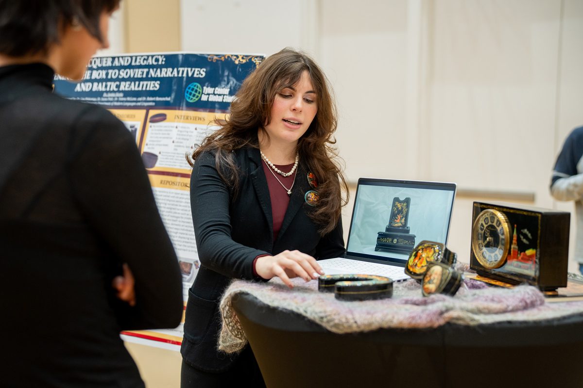 Student speaks about items on a table